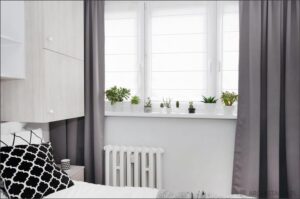 Co powiesić nad łóżkiem? Inspirujące pomysły na dekoracje i styl w sypialni